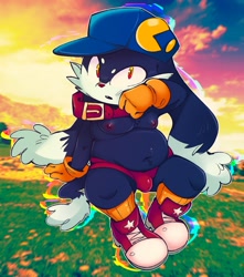 Size: 1769x2000 | Tagged: safe, artist:salamikii, klonoa, cat, felid, hybrid, lagomorph, mammal, rabbit, anthro, cub, cubs only, fat, male, males only, solo cub, solo male, young, klonoa series, photo background, alternate anatomy, ball cap, bulge, clothing, collar, gloves, hat, leaning on one arm, long ears, lop ears, moobs, navel, nipples, open legs, oversized collar, shoes, sitting, sneakers, socks, solo, speedo, swimsuit, topless, wiping face